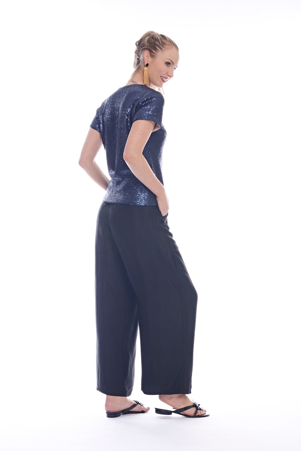 Blond-model-photographed-from-the-right-side-wearing-navy-metallic-cotton-top-and-black-Athens-pants-made-in-Australia-by-musee-today#colour_navy